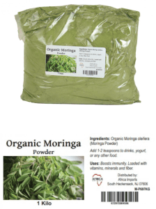 image showing bag of Organic Moringa powder and image of plant leaves. Ingredients: Organic Moringa Oleifera (Moringa Powder). Add 1-2 teaspoons to drinks, yogurt, or any other food. Uses: boosts immunity. Loaded with vitamins, minerals and fiber. Distributed by Africa Imports, South Hackensack, NJ 07606